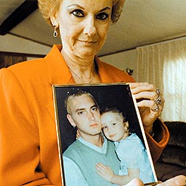 Deborah R. Nelson Mathers-Briggs (Eminem's mom) holding a picture of eminem